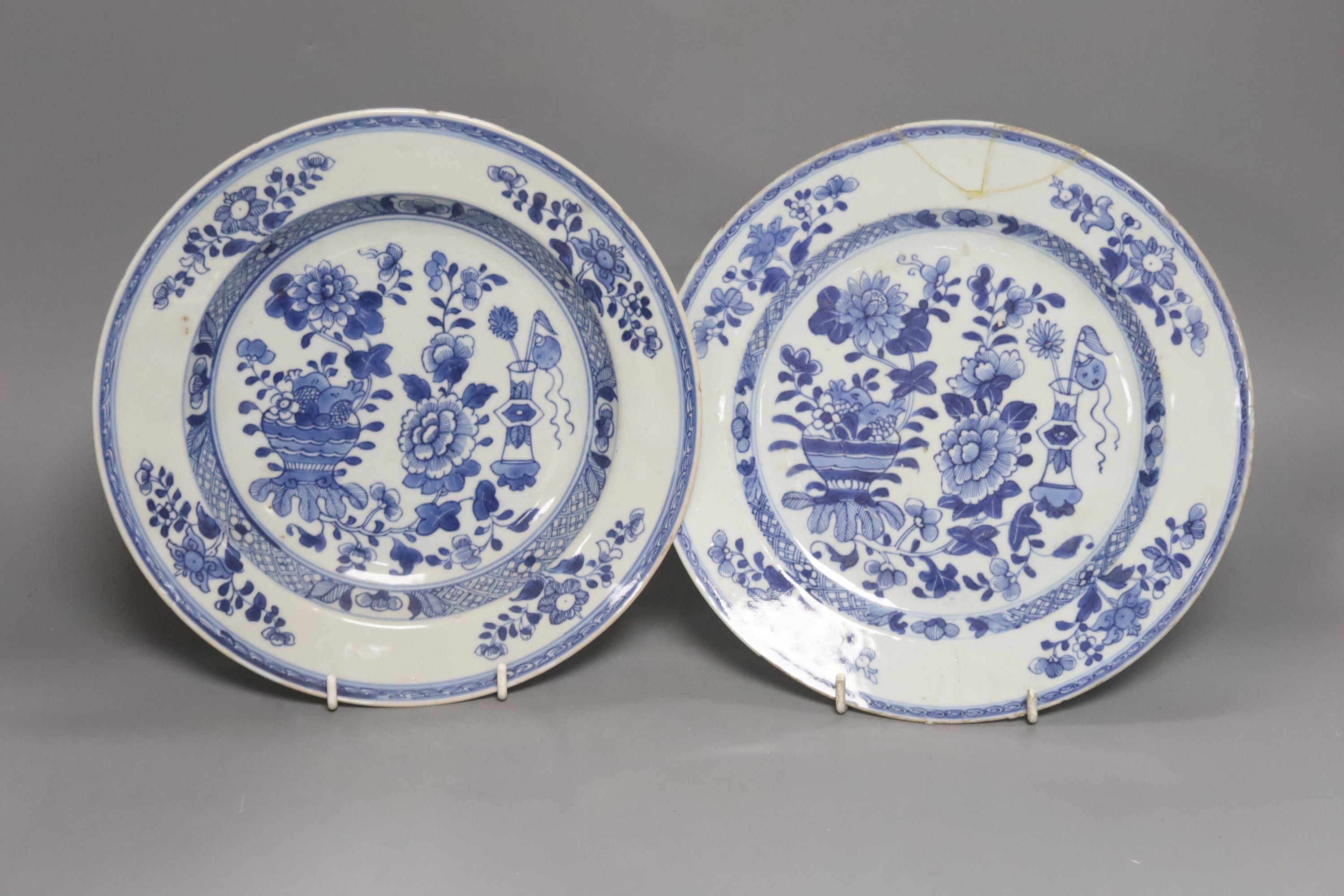 Six 18th century Chinese Export blue and white dishes with floral decoration and five matching plates, Dia 23cm